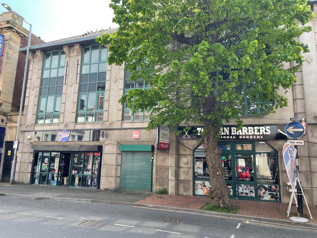 Lot: 72 - COMMERCIAL INVESTMENT WITH RESIDENTIAL CONSENT OF UPPER PARTS - view of front elevation from Langney Road 3